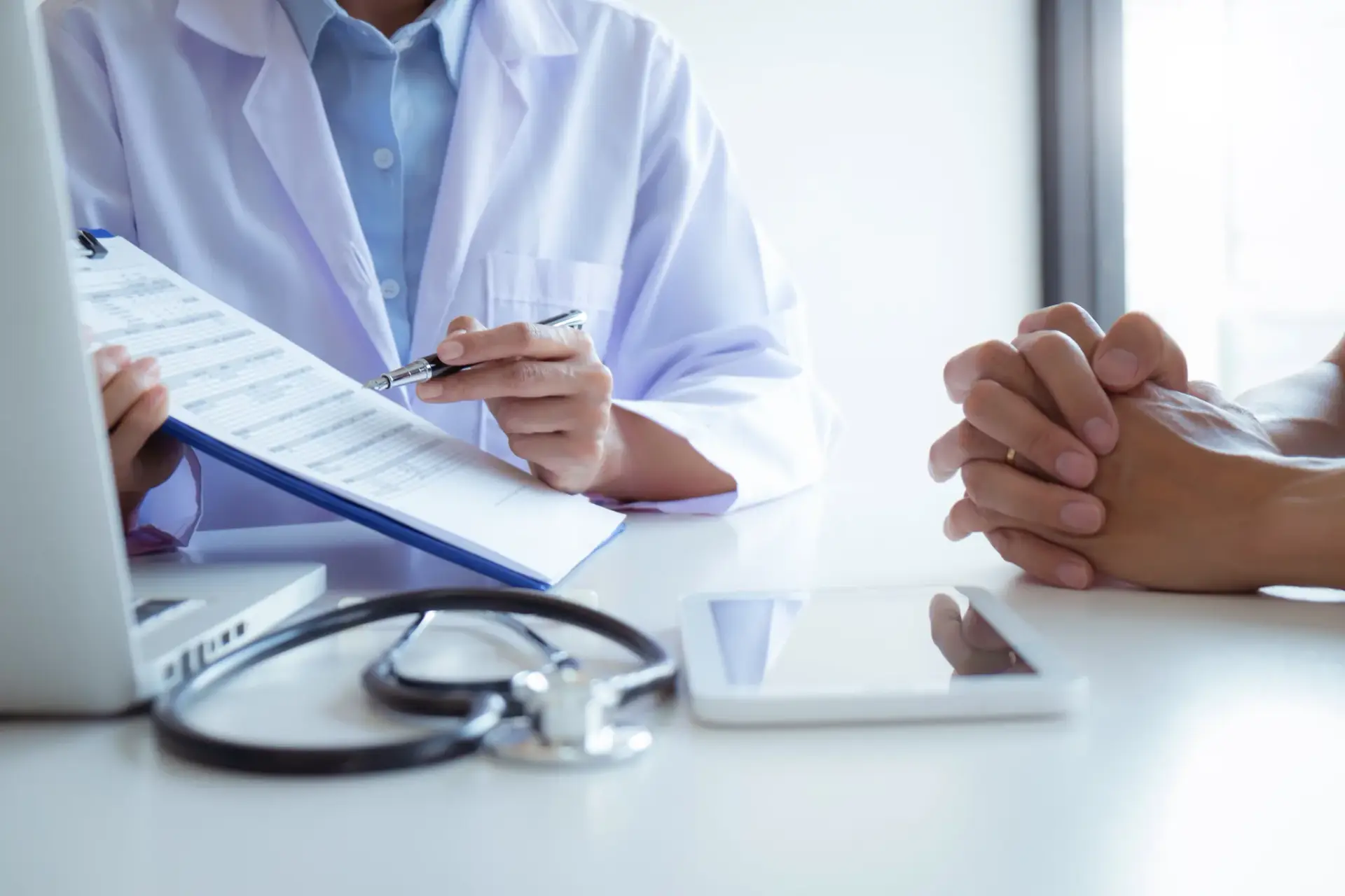 A naturopathic physician reviewing a care plan with a patient in South Tempe, AZ