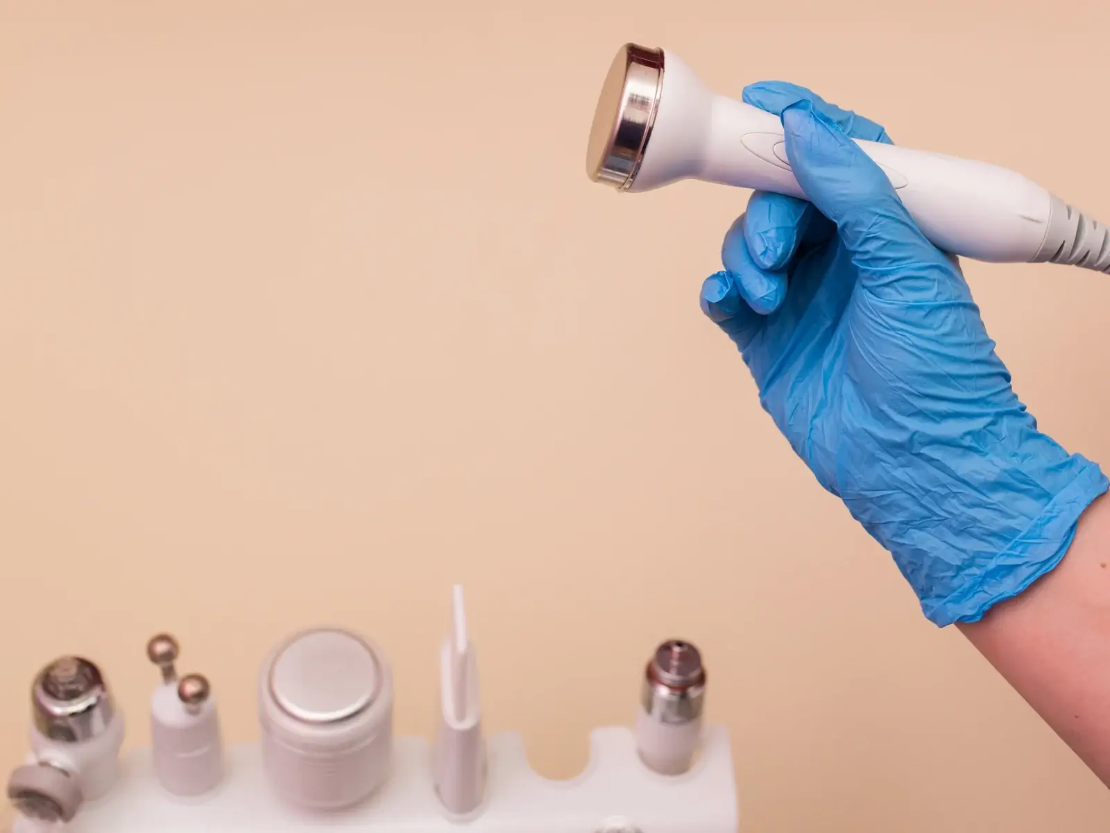 The AquaFirme XS handpiece being prepared for a hydrating facial treatment in South Tempe, AZ