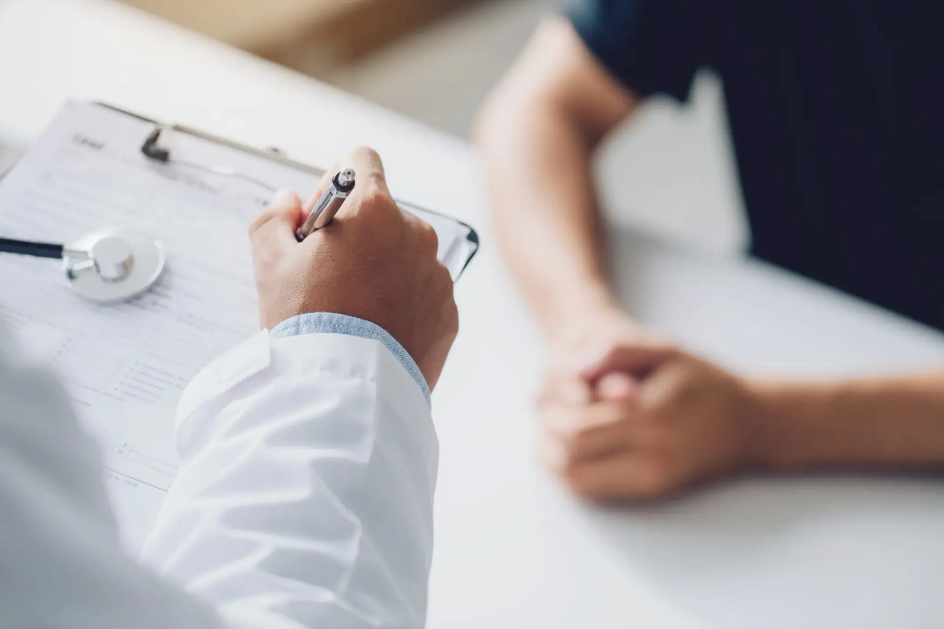 A naturopathic physician reviewing an environmental exposure history with a patient in South Tempe, AZ