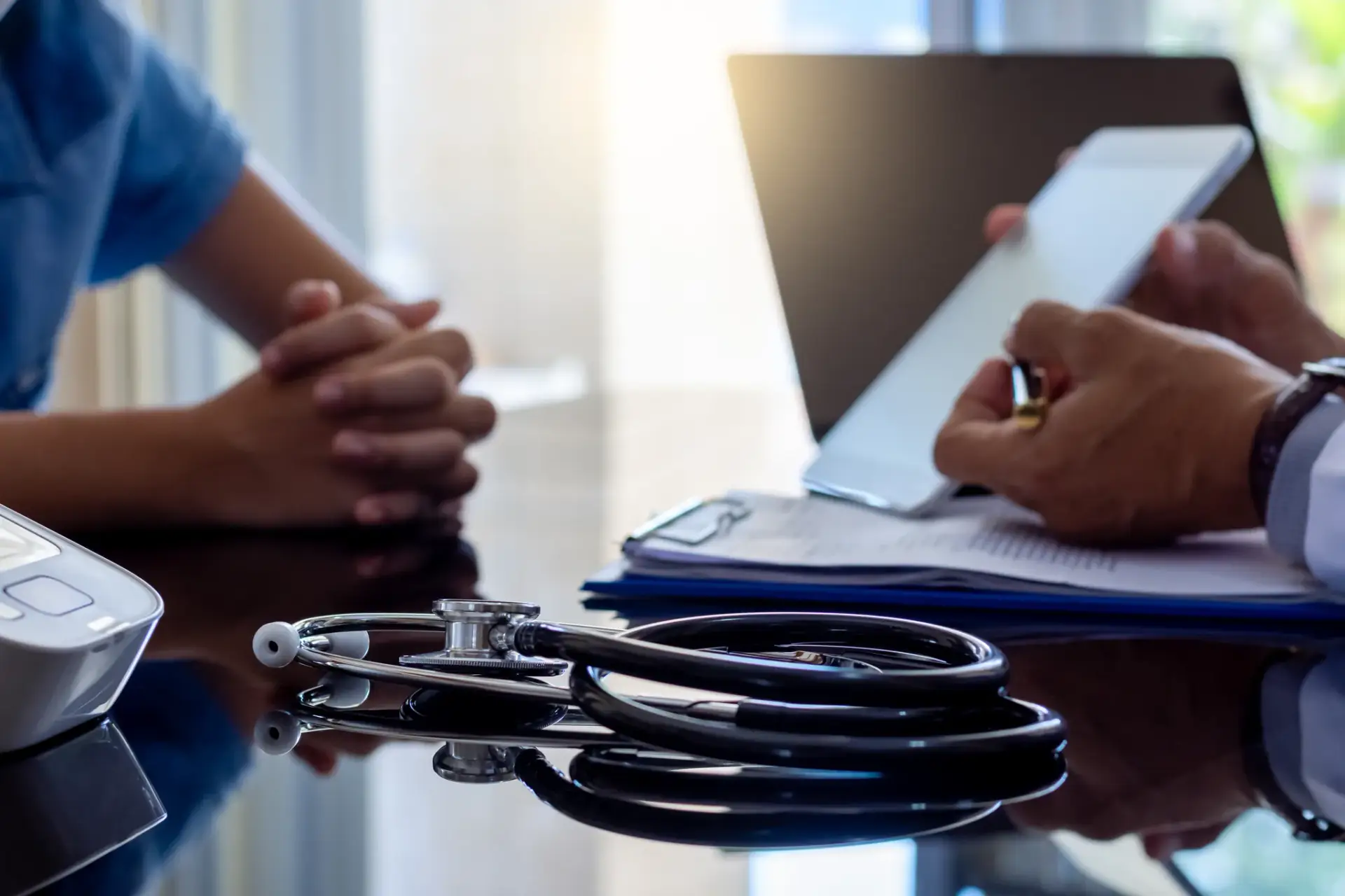 A naturopathic physician taking a full history during a functional medicine consultation in South Tempe, AZ