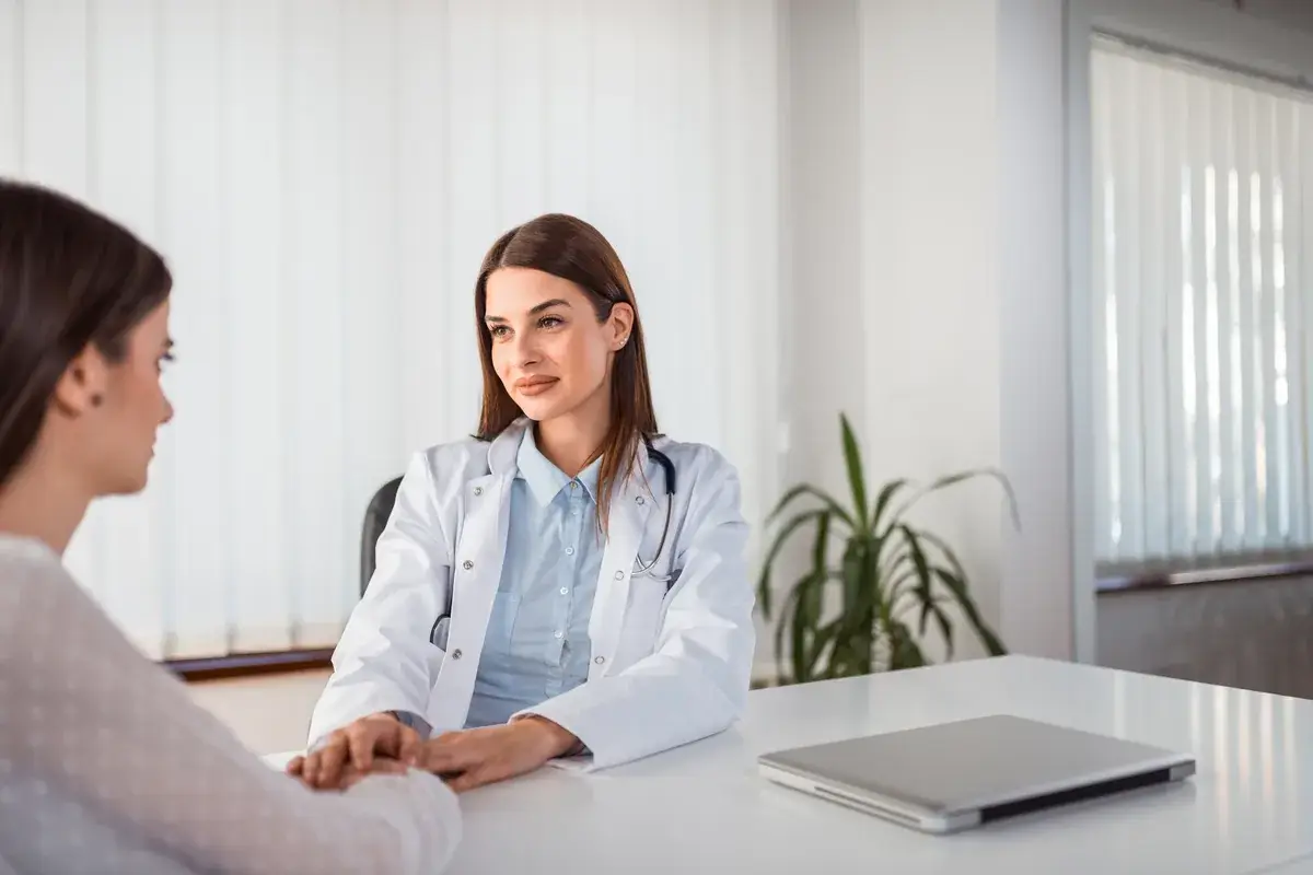 Naturopathic doctor listening to a patient during a root-cause gut health consultation in South Tempe, AZ