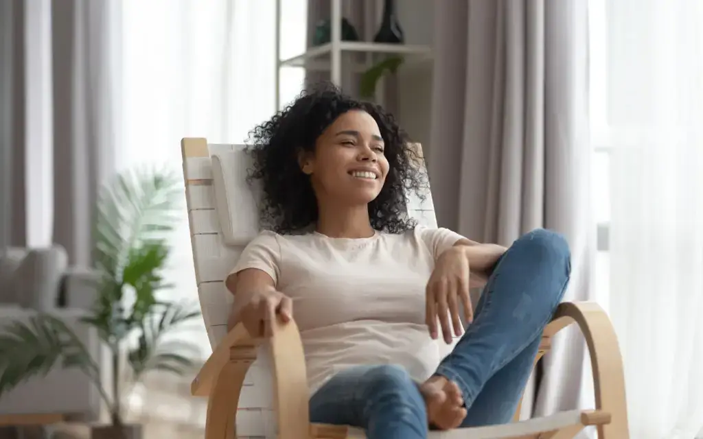 Relaxed, calm woman at home, reflecting mental health support in South Tempe