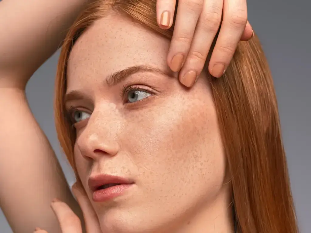 Woman with natural, filler-free skin texture after collagen-building aesthetics in Tempe, AZ
