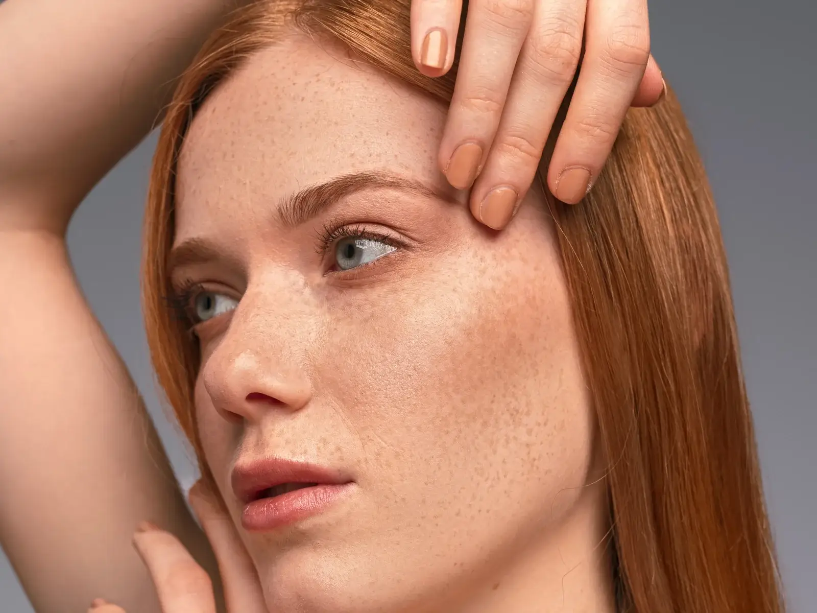 Woman with natural, filler-free skin texture after collagen-building aesthetics in Tempe, AZ