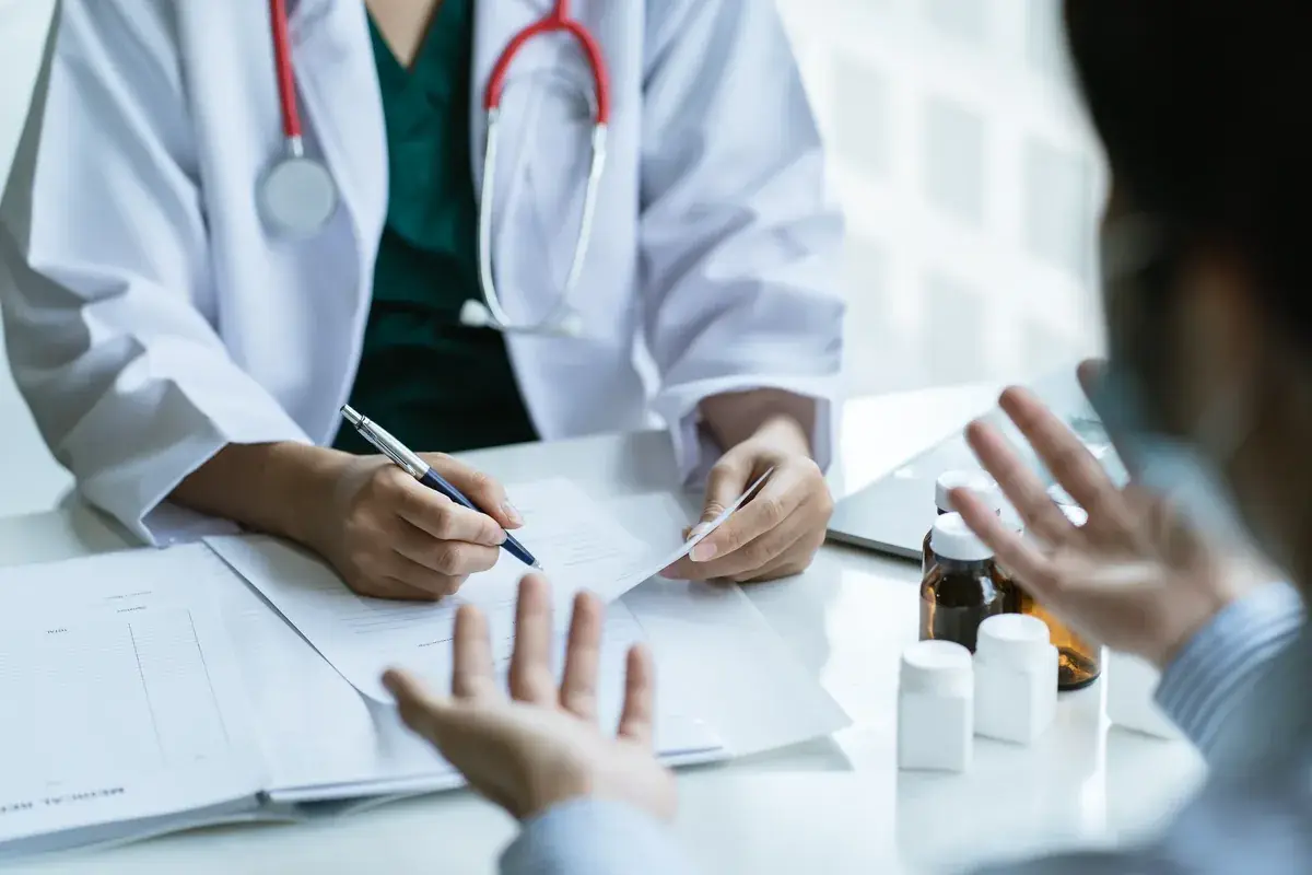 Physician reviewing a personalized medical weight loss plan with a patient in South Tempe, AZ