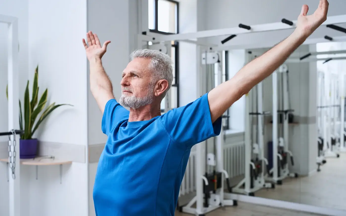 Man stretching during a recovery workout, peptide therapy for men in South Tempe, AZ