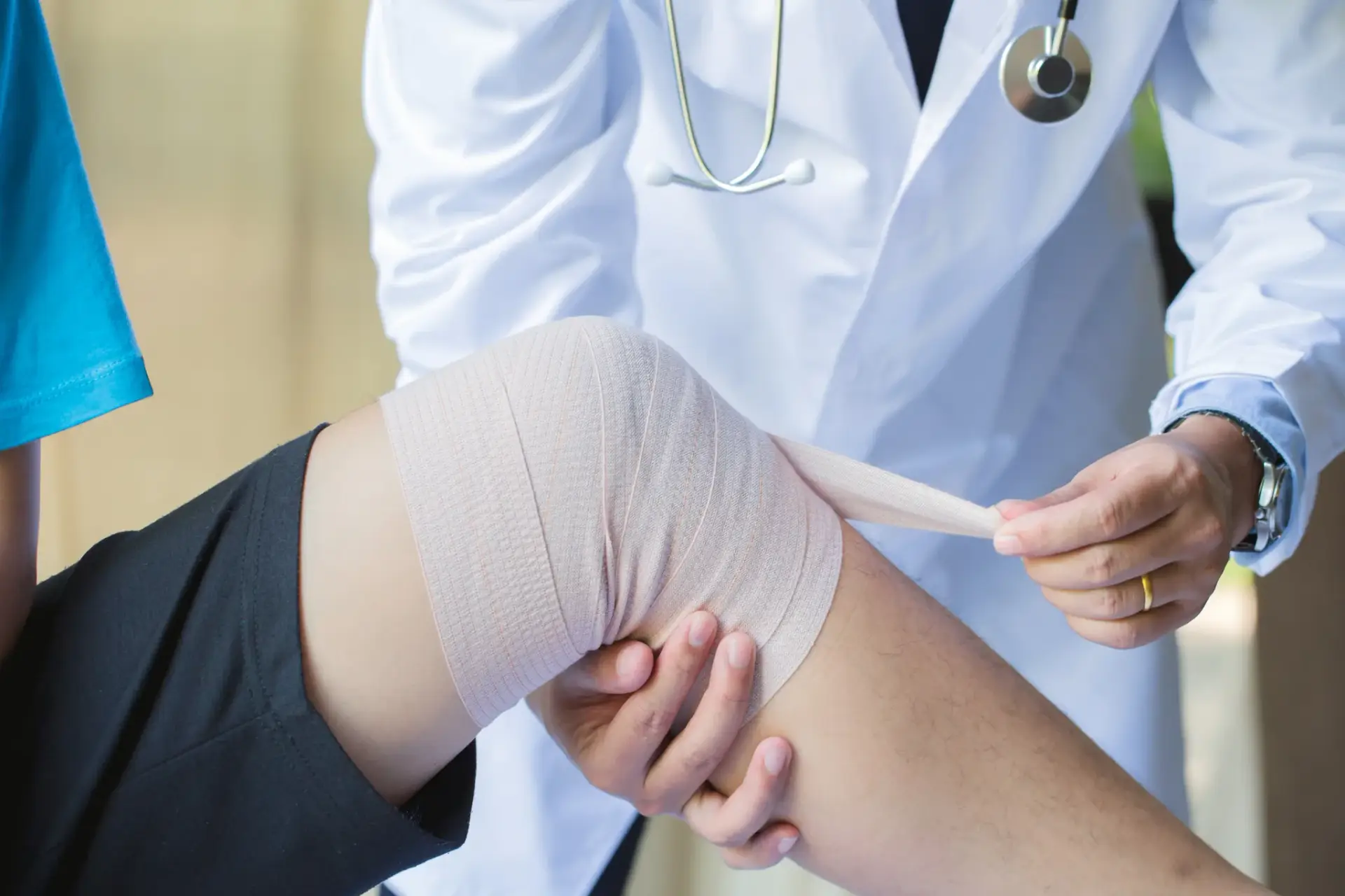 A physician examining a painful joint during a pain evaluation in South Tempe, AZ